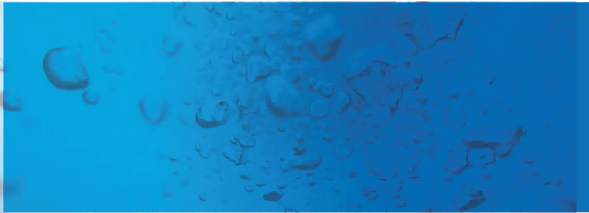 Imagen decorativa representando gotas de agua con tinte azul